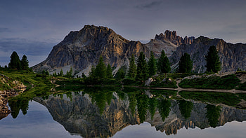 Beautiful Nice Landscape View Of Rock Mountains Spruce Trees Under Clouds Blue Sky Reflection On Lake Nature HD wallpaper