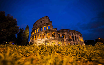 Colosseum Rome night, Ancient ruins, Decaying architecture, Mysterious ambiance HD wallpaper