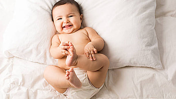 Cute Smiling Baby Is Lying Down On White Bed Cute HD wallpaper