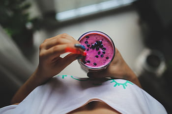 Enjoy a healthy and vibrant blueberry yogurt smoothie with a pop of color, perfect for a nutritious lifestyle. HD wallpaper