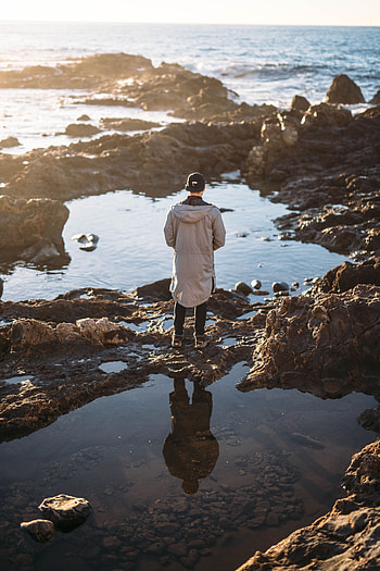 Water, Sea, Rocks, Coast, Miscellanea, Miscellaneous, Human, Person HD phone wallpaper
