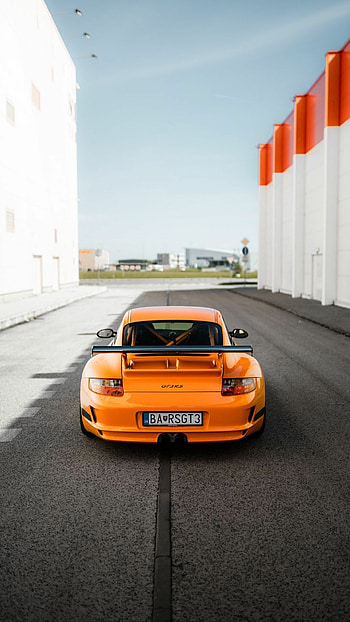 Cool Porsche 911 GT3, Striking performance, Sleek aesthetics, Top-of-the-line design HD phone wallpaper