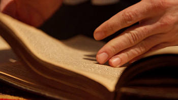 Person flipping through book pages, Reading journey, Story immersion, Page-turning suspense HD wallpaper