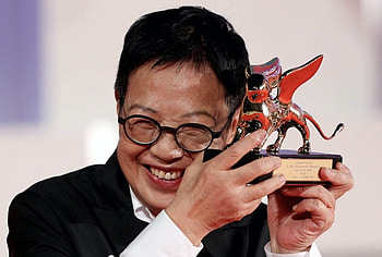 China/Hong Kong filmmaker, Golden Lion lifetime achievement, Venice Film Festival, International recognition HD wallpaper