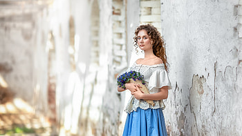 Girl Model Is Standing In White Broken Wall Background Wearing White Top And Blue Skirt With Flowers Girls HD wallpaper