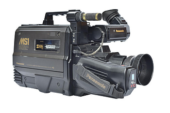 Old movie camera, Vintage cinematography, Classic film equipment, Cinema history HD wallpaper