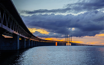 Sunset, sea, clouds, bridge, sky HD wallpaper
