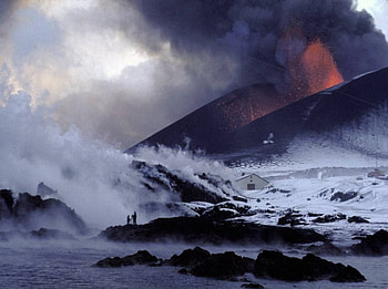 Eruption in winter, winter, waves, snow, volcano, eruption, mountains, ocean HD wallpaper