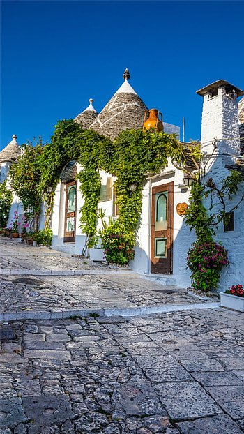 Exploring trulli houses, Alberobello's magical allure HD phone wallpaper