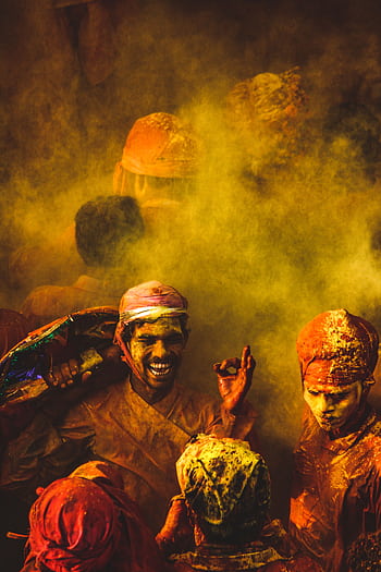 Joyful group celebrating Holi with vibrant colors and traditional attire in India. HD phone wallpaper