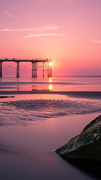 Pier beach sunset, Idyllic setting, Peaceful waters, Golden reflections HD phone wallpaper