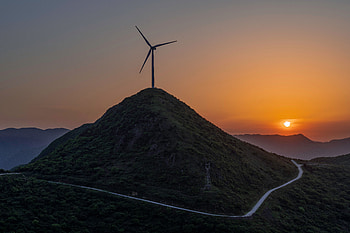 Hill, road, curve, sunset, wind-turbine HD wallpaper