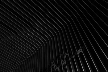 Abstract featuring a dark, metallic, and patterned design with a captivating texture. HD wallpaper