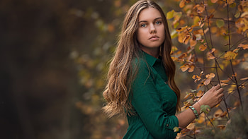 Blue Eyes Blonde Girl Model Is Standing In Blur Leaves Background Wearing Green Dress Girls HD wallpaper