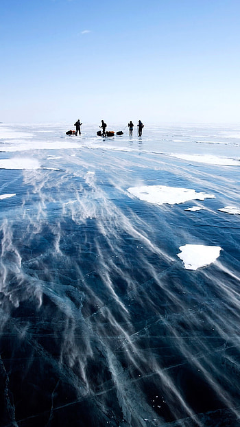Glistening snowdrifts, Baikal's surface, Winter's charm, Windows spotlight HD phone wallpaper