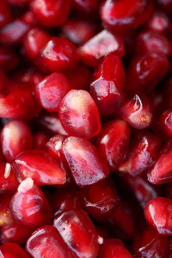 Explore the refreshing and healthy red pomegranate seeds with this vibrant close-up view. HD phone wallpaper