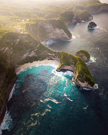 Stunning aerial view of Bali's coastline with turquoise waters and lush cliffs. HD phone wallpaper
