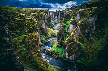 Discover the stunning moss-covered canyon in Iceland, showcasing nature's raw beauty. HD wallpaper