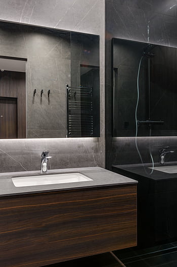 Elegant contemporary bathroom with marble surfaces and wooden vanity. HD phone wallpaper