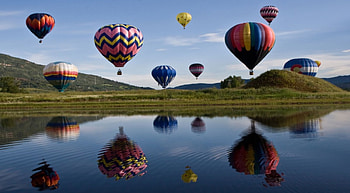 Nice Array of Hot Air Balloons, landscape, hot, colors, grass, lake, day, balloons, air, green, clouds, nature, sky, water HD wallpaper
