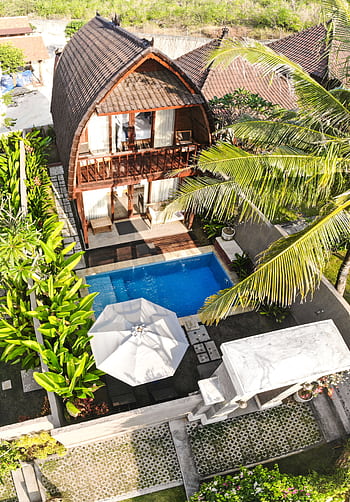 Explore luxury and tranquility at this tropical villa in Bali, featuring a private pool and lush gardens. HD phone wallpaper