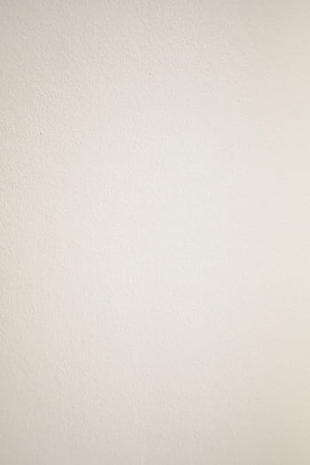 A neutral textured paper surface ideal for backgrounds and art projects. HD phone wallpaper