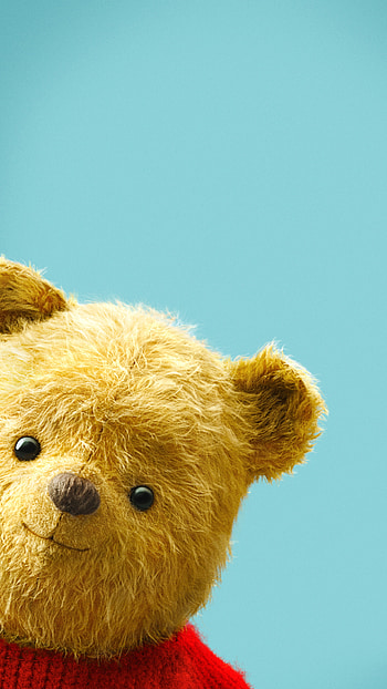 Winnie the Pooh in Christopher Robin, Endearing friendship, Charming animated character, Heartwarming tale HD phone wallpaper