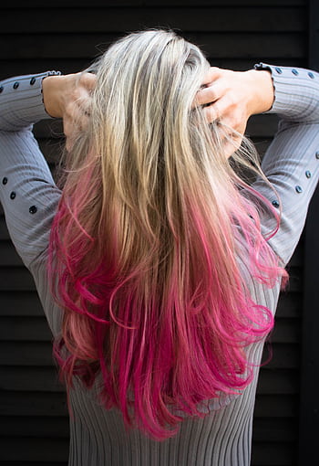 Close-up of a woman with blonde and pink ombre hair in a stylish pose. HD phone wallpaper