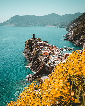 Stunning view of Vernazza with colorful houses on cliffs by the sea, Liguria, Italy. HD phone wallpaper