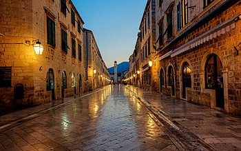 rain soaked street in dubrovnik croatia, rain, city, lights, street, dusk, stones HD wallpaper