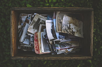 A nostalgic collection of vintage in an old wooden box. HD wallpaper