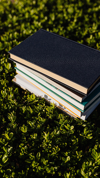 Stack of books, Sony Xperia Z5 Premium, background, Bookworm's delight HD phone wallpaper