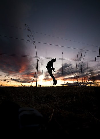 Sunset, Grass, Dark, Silhouette, Human, Person, Bounce, Jump HD phone wallpaper