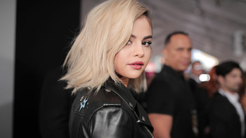 White Short Hair Selena Gomez Is Wearing Black Jacket Standing In Blur People Background Girls HD wallpaper