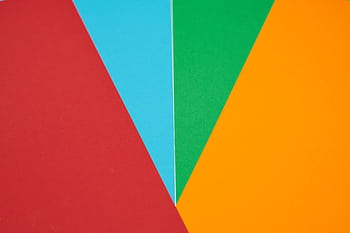Colorful abstract design featuring red, blue, green, and orange geometric shapes. HD wallpaper