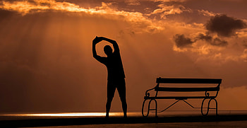 Fitness at sunrise, Outdoor workout, Yoga poses, Cloudy sky HD wallpaper