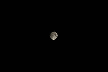 Stunning view of the full moon against a plain black night sky. Perfect for astronomy enthusiasts. HD wallpaper