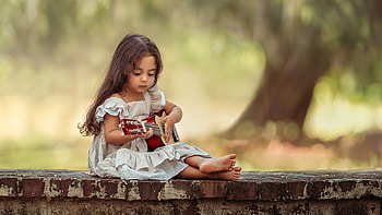 Cute girl playing Guitar HD wallpaper