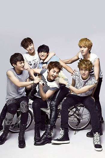 EXO 12 members, Dynamic group, Diverse talent, Unforgettable music HD phone wallpaper
