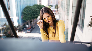 Victoria Justice Is Wearing Yellow Dress Holding Eyeglasses With Hand Girls HD wallpaper