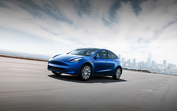 Tesla Model Y, Revolutionary electric SUV, Cutting-edge technology, Unparalleled range HD wallpaper