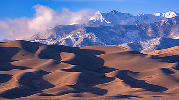 Dunes Sand Shadow In Snow Capped Trees Mountains Slope Blue Sky Background With Sunlight Mountain HD wallpaper