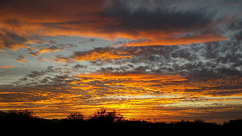 orange and gray cloudy skies HD wallpaper