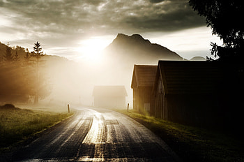 Sunlight, rays, sunbeams, peaceful, houses, sunrise, beauty, trees, amazing, road, mountains, sun, sunset, house, landscape, beautiful, tree, sunrays, view, clouds, nature, sky, lovely, splendor, village HD wallpaper