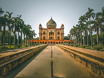 Explore the stunning Safdarjung Tomb in New Delhi, India, surrounded by lush gardens and palm trees. HD wallpaper