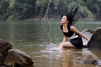Model in a Black Dress( Washing her hair?), river, model, dress, brunette HD wallpaper