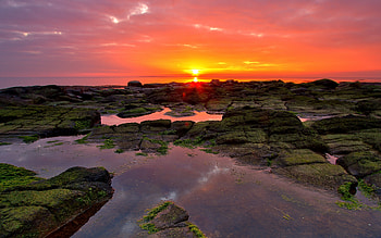 Sunset, rays, colorful, sunlight, colors, peaceful, beauty, reflection, water, sun, ocean, sea, beautiful, rocks, view, clouds, nature, sky, lovely HD wallpaper