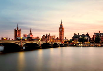 Scenic view of Big Ben and Westminster Bridge over the Thames River at sunset in London, UK. HD wallpaper