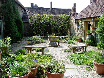 courtyard, relaxing, flowers, houses HD wallpaper