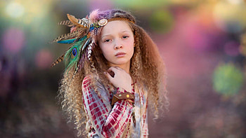 Curly Hair Cute Little Girl Is Standing In Blur Colorful Background Wearing Maroon Grey Dress Cute HD wallpaper